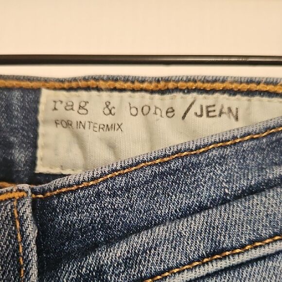 Women's Blue Distressed Jeans With Raw Hem - Picture 2 of 16